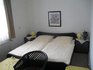 Postel nebo postele na pokoji v ubytování Hotel Richthofen