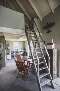 Φωτογραφία από το άλμπουμ του Kakariki Cottage σε Papakura