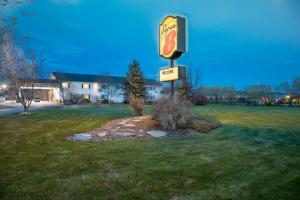 a sign for a fast food restaurant in a field at Super 8 by Wyndham Driggs in Driggs