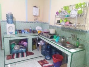 A kitchen or kitchenette at Mango Tree Homestay & Ijen Tour