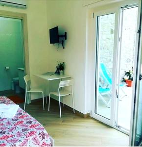 TV a/nebo společenská místnost v ubytování B&b Il sogno