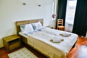 Postel nebo postele na pokoji v ubytování Villa "Forest way"