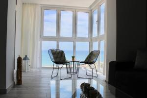 Posezení v ubytování Apartamento con vistas al mar