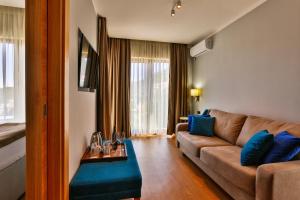 Posezení v ubytování Hotel Lusso Mare by Aycon