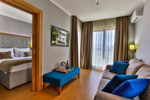 Postel nebo postele na pokoji v ubytování Hotel Lusso Mare by Aycon