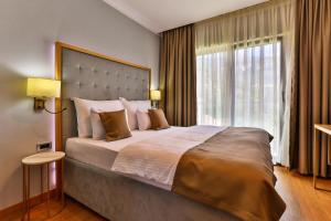 Postel nebo postele na pokoji v ubytování Hotel Lusso Mare by Aycon + 37 fotografií