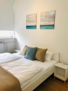 Ένα ή περισσότερα κρεβάτια σε δωμάτιο στο Arbio I Cube Studios & Apartments St Pauli