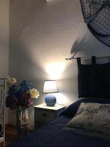 Postel nebo postele na pokoji v ubytování La Perla Scala dei Turchi