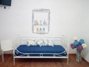 Postel nebo postele na pokoji v ubytování La Perla Scala dei Turchi