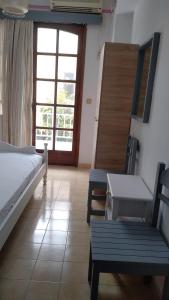 A bed or beds in a room at Nitsas studio's