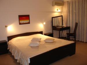 Postel nebo postele na pokoji v ubytování Hotel Klisura