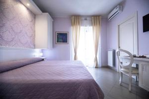 A bed or beds in a room at B&B Brindesi