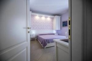 A bed or beds in a room at B&B Brindesi