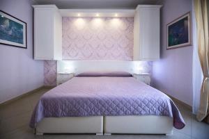 A bed or beds in a room at B&B Brindesi