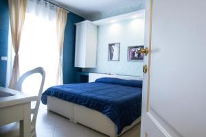 A bed or beds in a room at B&B Brindesi