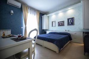A bed or beds in a room at B&B Brindesi