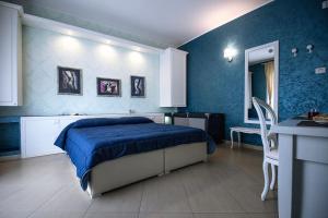 A bed or beds in a room at B&B Brindesi