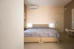 A bed or beds in a room at B&B Brindesi