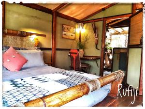 Ліжко або ліжка в номері Chinderera Eco Lodge