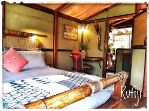 Ένα ή περισσότερα κρεβάτια σε δωμάτιο στο Chinderera Eco Lodge