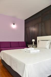 Postel nebo postele na pokoji v ubytování Osten Art Hotel