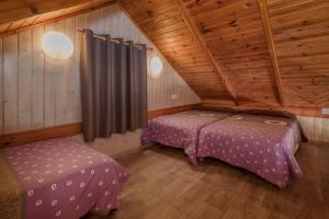 Llit o llits en una habitació de Camping Solmar
