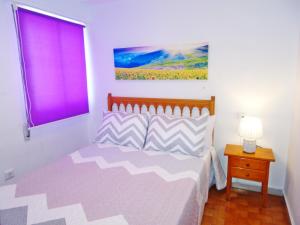 Łóżko lub łóżka w pokoju w obiekcie SAFOR GANDIA - Alquiler solo Familias