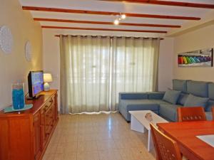 Telewizja i/lub zestaw kina domowego w obiekcie SAFOR GANDIA - Alquiler solo Familias