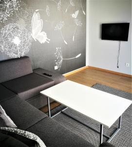TV a/nebo společenská místnost v ubytování Panorama Vista Gudauri Apartments