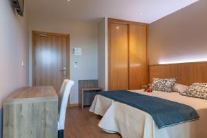 Postel nebo postele na pokoji v ubytování Hotel Turimar