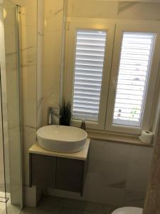 Kúpeľňa v ubytovaní Apartment Chupa