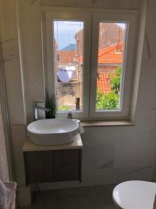 Kúpeľňa v ubytovaní Apartment Chupa