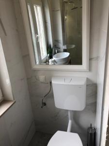 Kúpeľňa v ubytovaní Apartment Chupa
