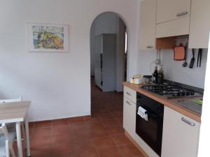 Kuchyň nebo kuchyňský kout v ubytování Grazioso appartamento tra cultura, lago e montagna + 8 fotografií