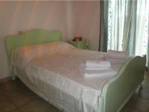 Posteľ alebo postele v izbe v ubytovaní Dimis Country House