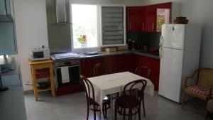 Kuchyň nebo kuchyňský kout v ubytování Clos l'Oustal