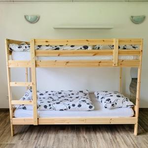 Postel nebo postele na pokoji v ubytování Bright Side Studios