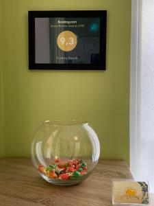 a bowl of candy is sitting on a table at Yuzhniy Dvorik in Odesa