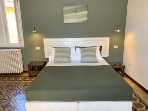 Postel nebo postele na pokoji v ubytování Porta Ronca - B&B, Suites & Apts