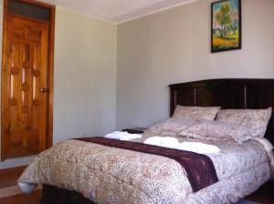 Postel nebo postele na pokoji v ubytování Hostal Jora Continental