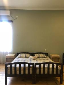 Postel nebo postele na pokoji v ubytování Mimino Guest House