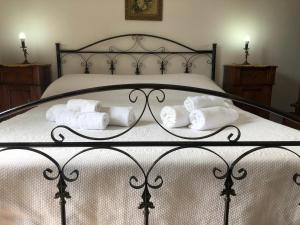 En eller flere senge i et værelse på Residenza Amante