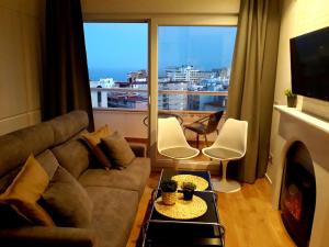 A seating area at Apartamento vista bonita