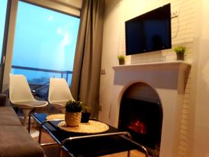 A television and/or entertainment centre at Apartamento vista bonita