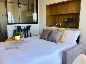 A bed or beds in a room at Apartamento vista bonita Még 37 kép