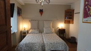 Postel nebo postele na pokoji v ubytování B&B Maison Odille
