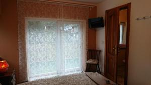 TV a/nebo společenská místnost v ubytování B&B Maison Odille