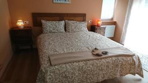 Postel nebo postele na pokoji v ubytování B&B Maison Odille