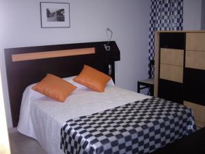 A bed or beds in a room at La Traina