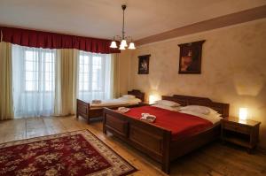 Posteľ alebo postele v izbe v ubytovaní Pension Pod Radnicí